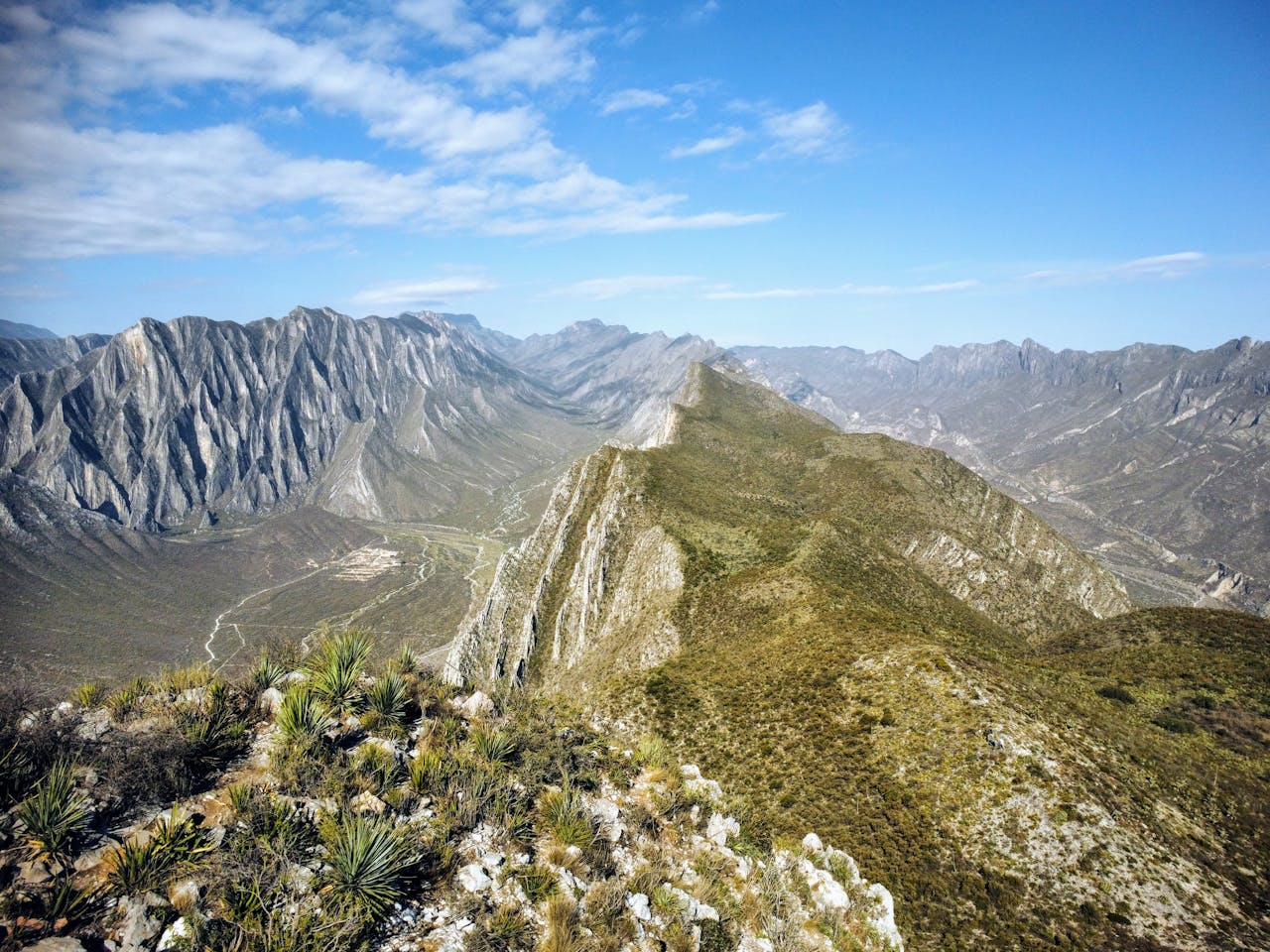 gallery-03 Stunning mountainous landscape in Monterrey, Mexico under a clear blue sky.